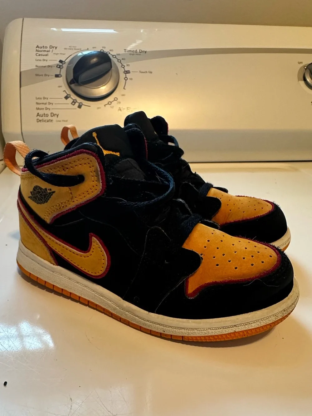 Nike Air Jordan 1 Mid-Top Basketball Shoes in Black and Yellow Vivid Orange 10